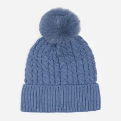 Bonnet bleu tricot à torsades et pompon