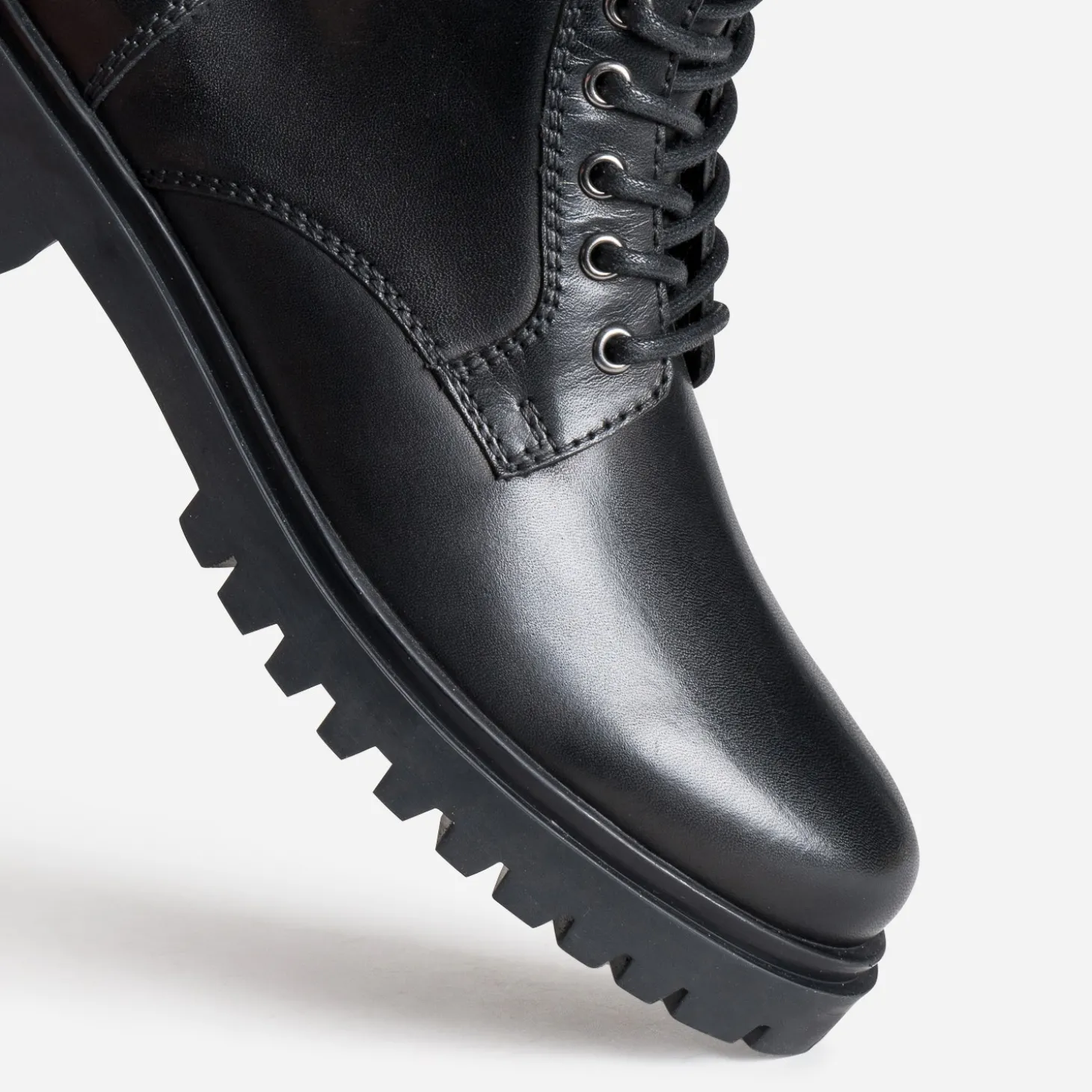 Boots à lacet noir cranté en cuir