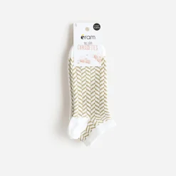 Chaussettes écrues et chevrons dorés