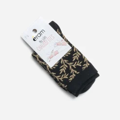 Chaussettes noires motif feuilles dorées