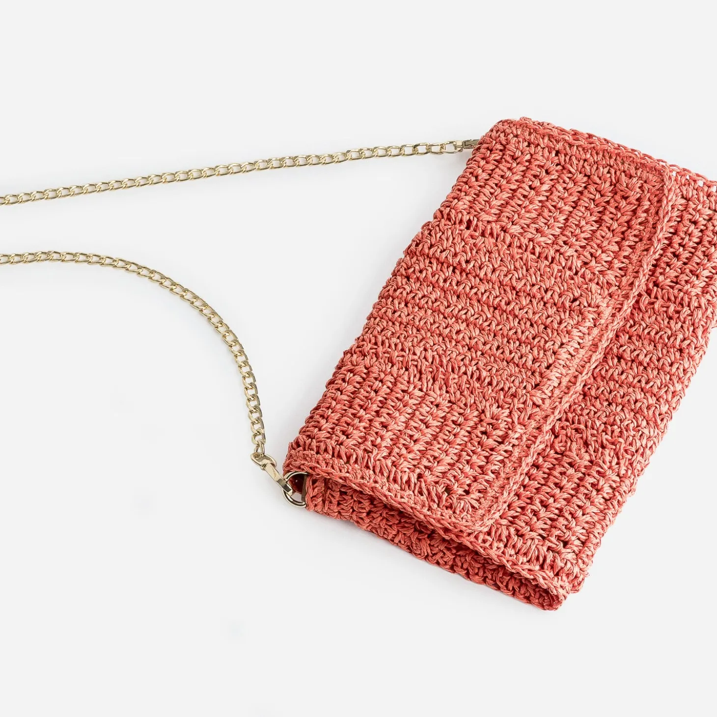 Pochette souple orange en paille