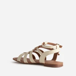 Sandale spartiate beige tressée décor soleil